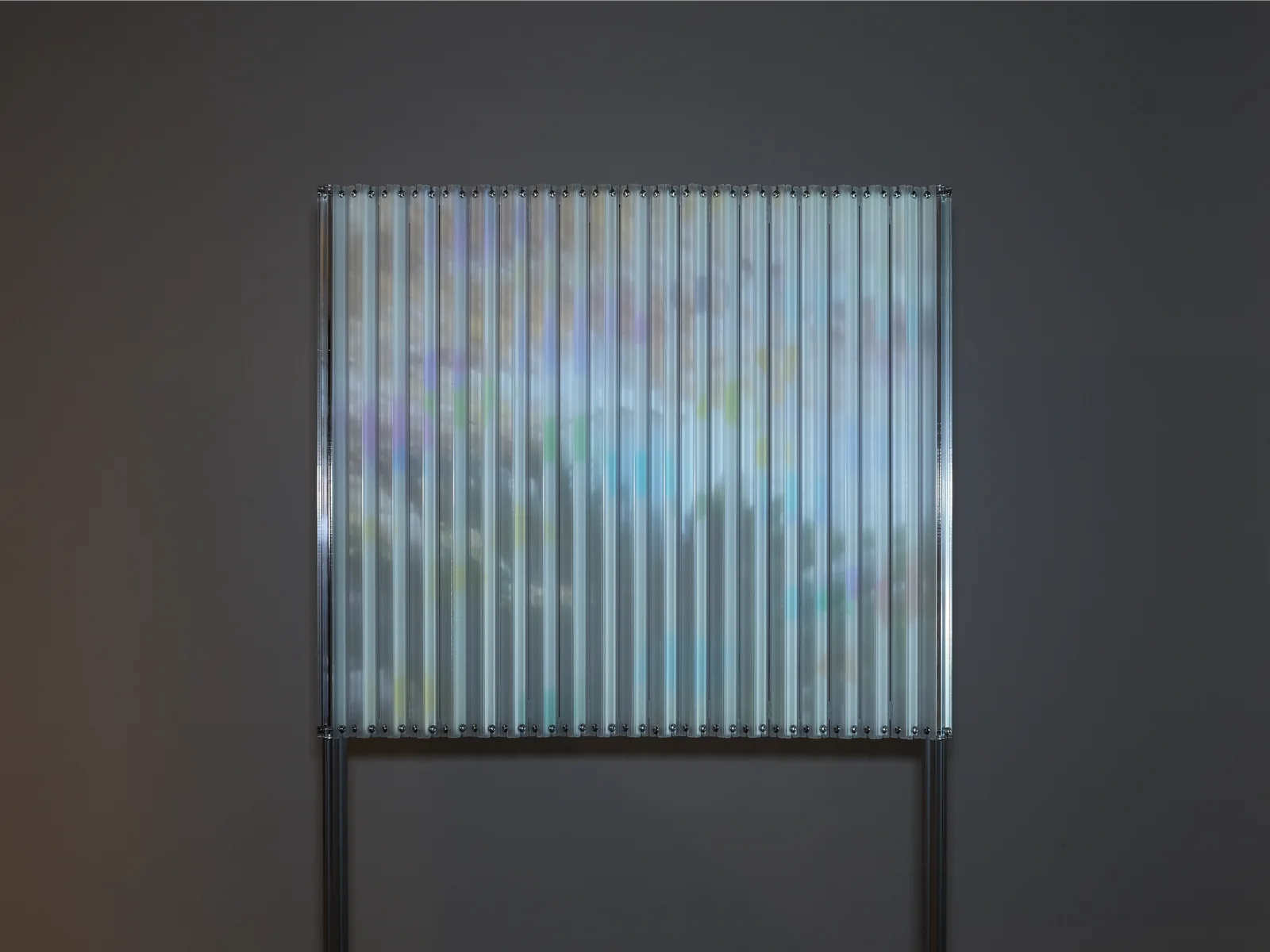 Lenticular Dream, 2023 — Aluminum, acrylic, projection 27” x 59” x (18” or 1” variable dimensions)