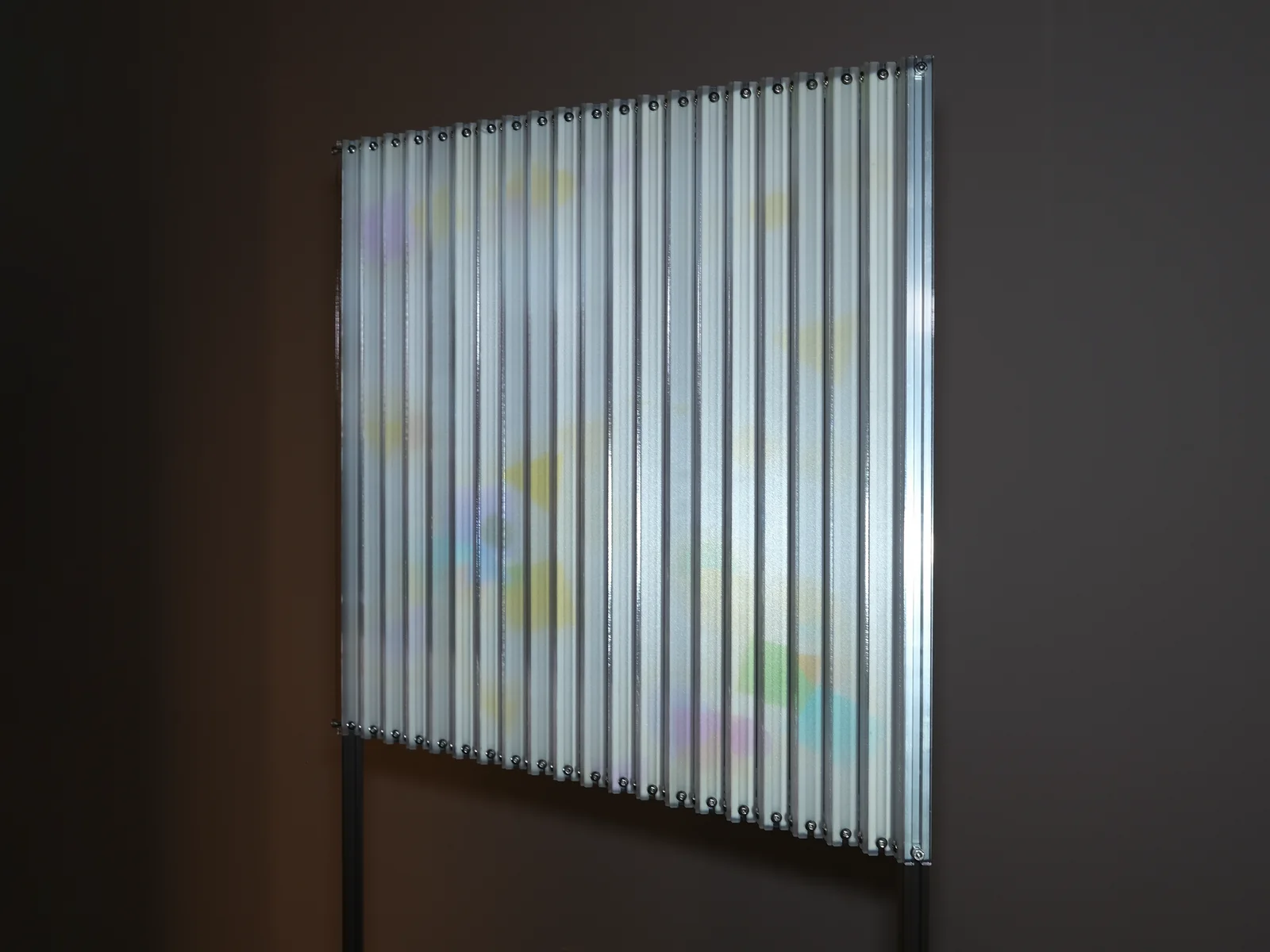 Lenticular Dream, 2023 — Aluminum, acrylic, projection 27” x 59” x (18” or 1” variable dimensions)