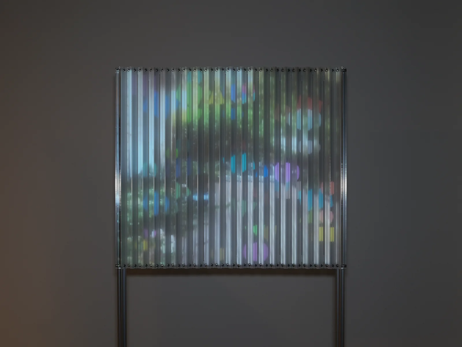 Lenticular Dream, 2023 — Aluminum, acrylic, projection 27” x 59” x (18” or 1” variable dimensions)